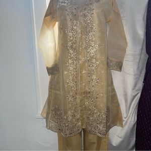 Occasion traditional wear. Fits up to small, medium.